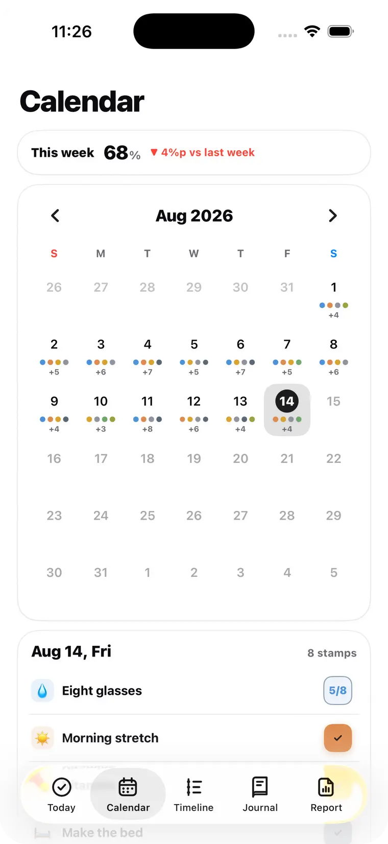 Calendar tab — a month grid where each day keeps the colors of the stamps pressed that day